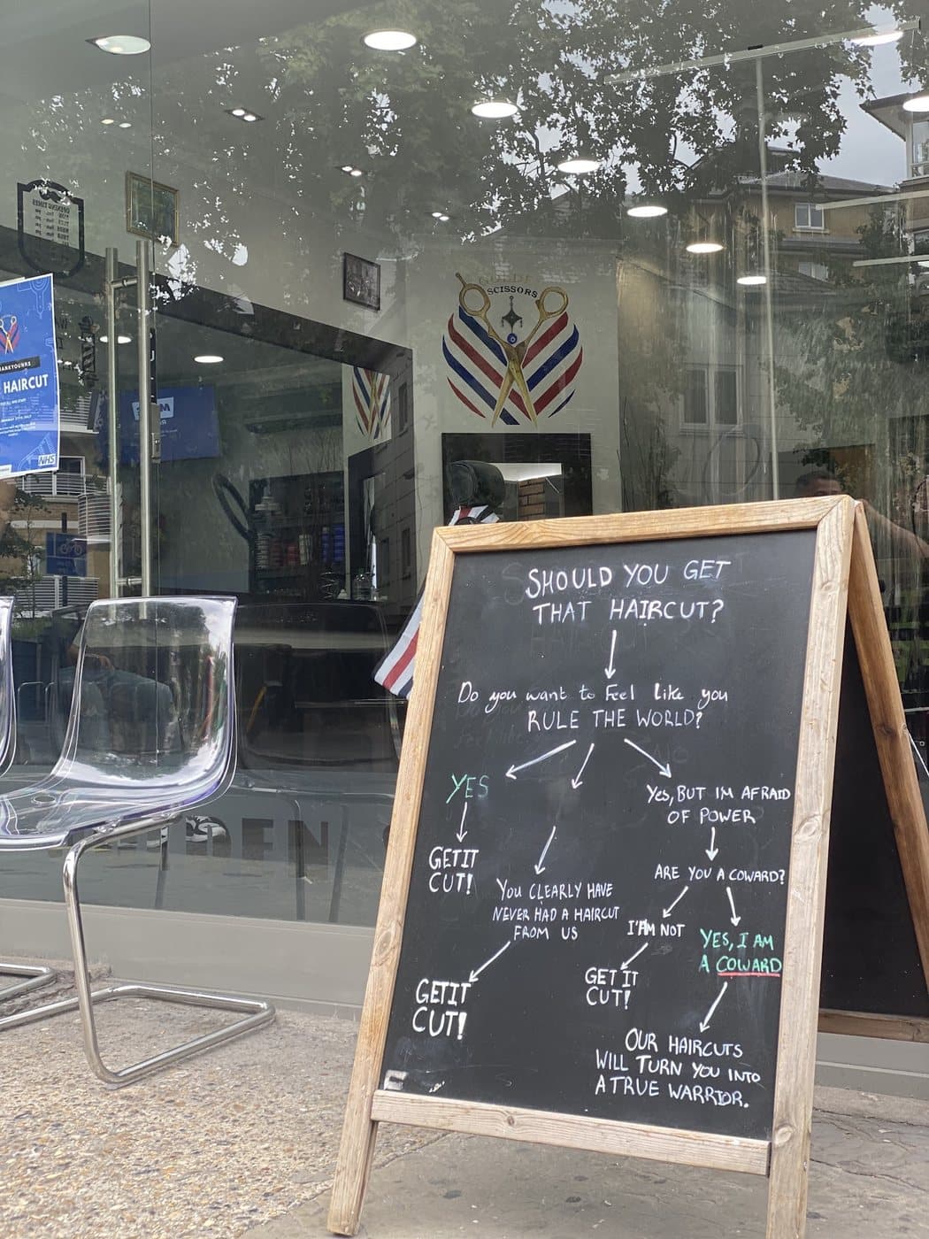 The pavement chalkboard outside the shop